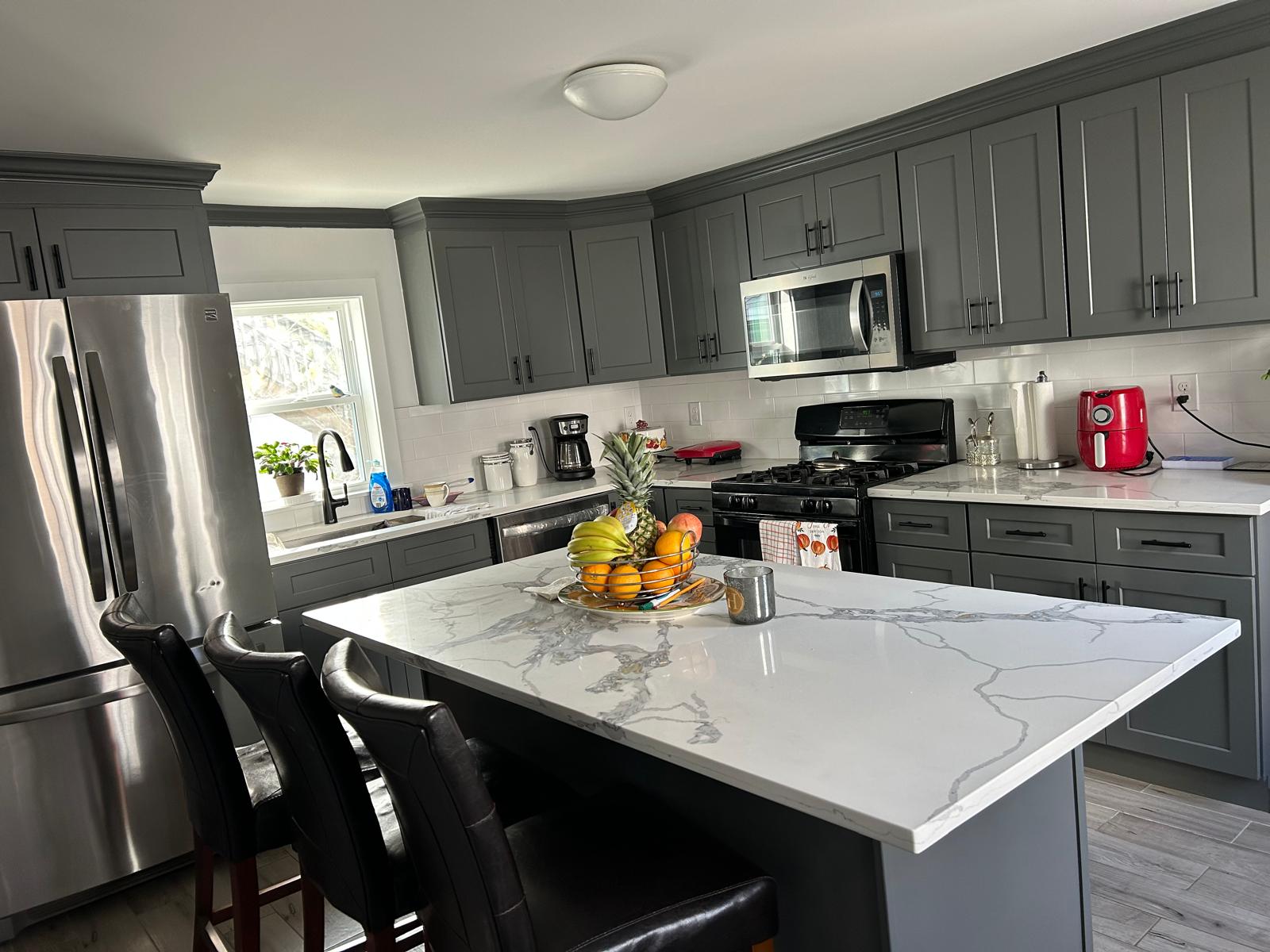 Kitchen cabinets painted by Creative Painting