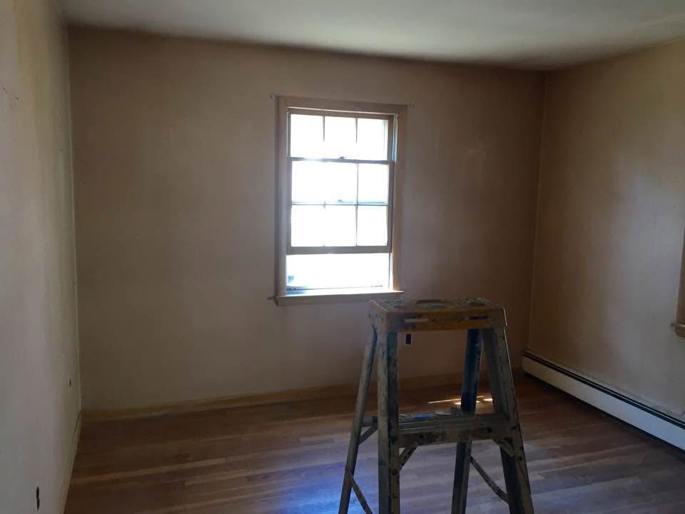 Room after wallpaper removal and painting